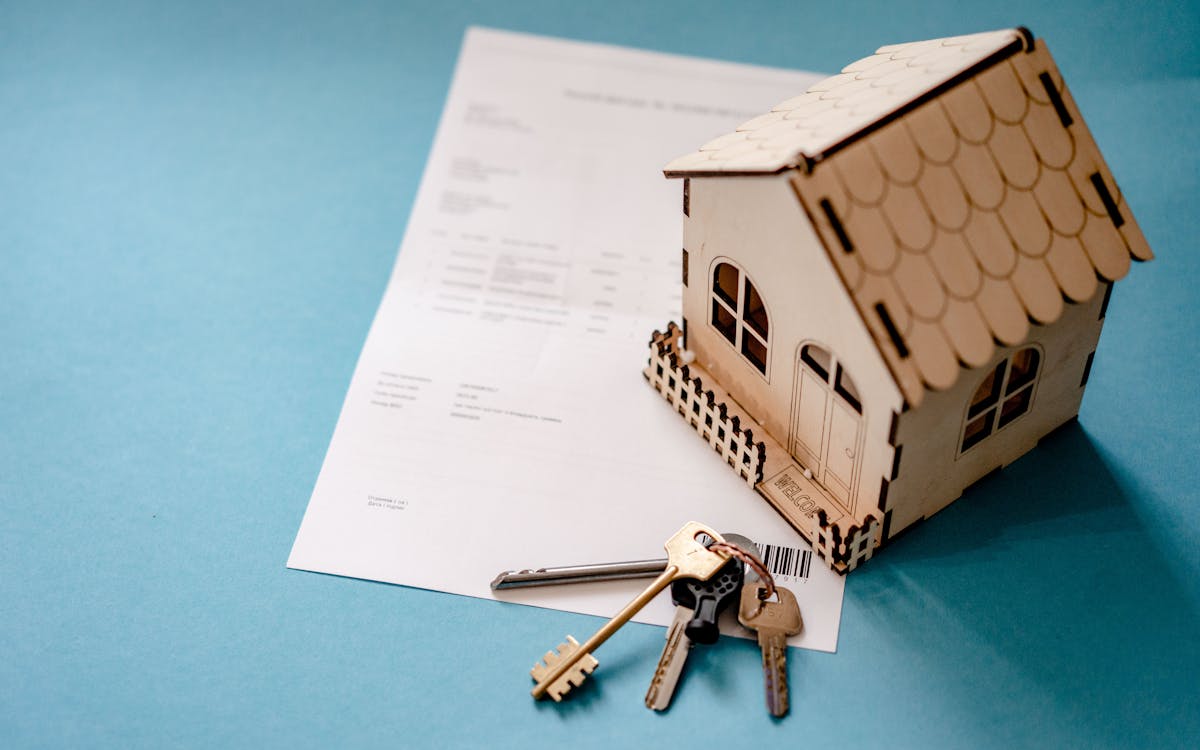 House keys resting on a property agreement