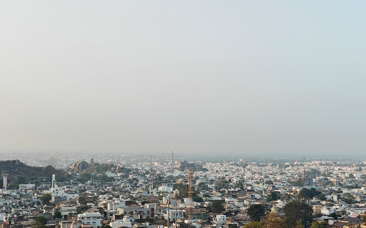 An aerial view of a modern city skyline
