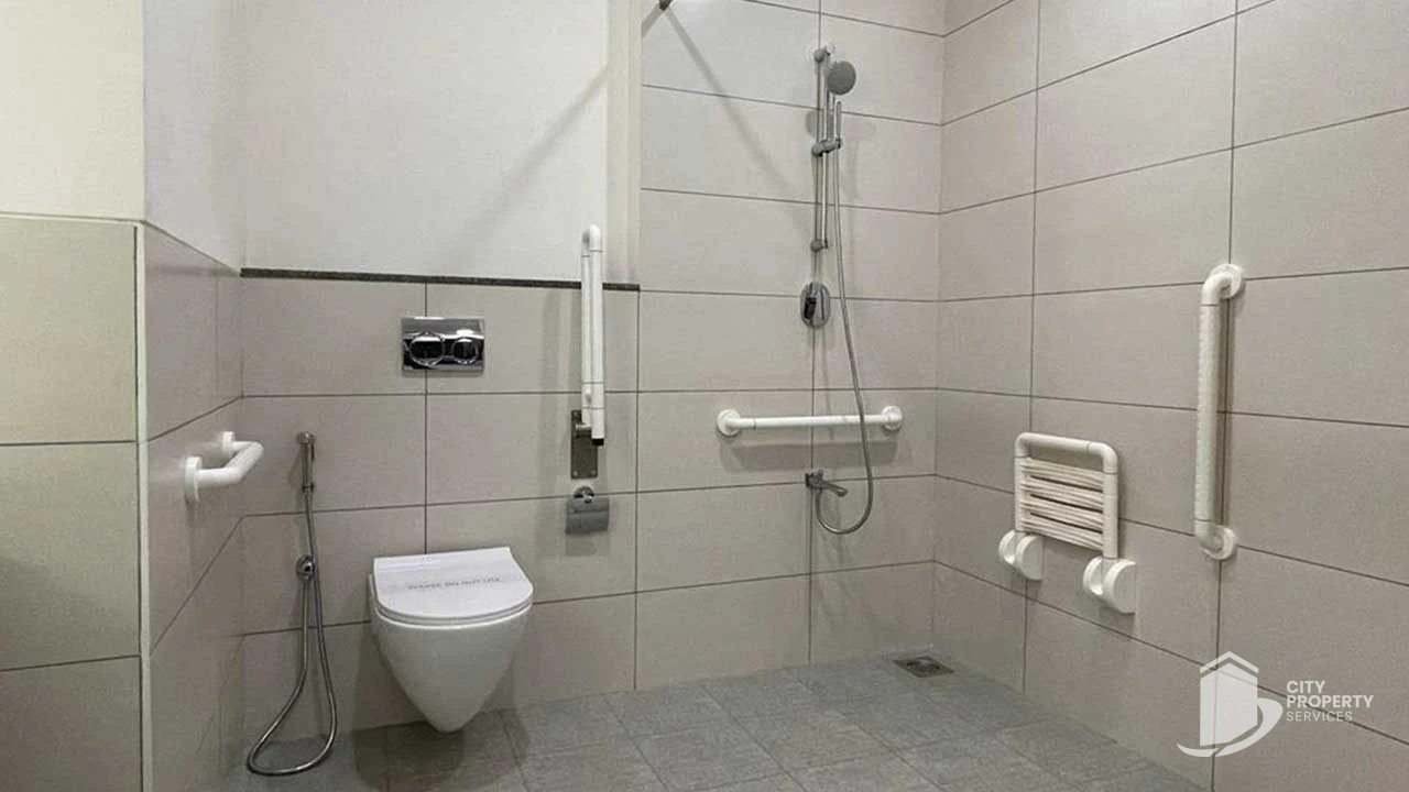 Ikaria, Adani Shantigram, shower seat and grab bars in the primary washroom (developer image) | City Property Services